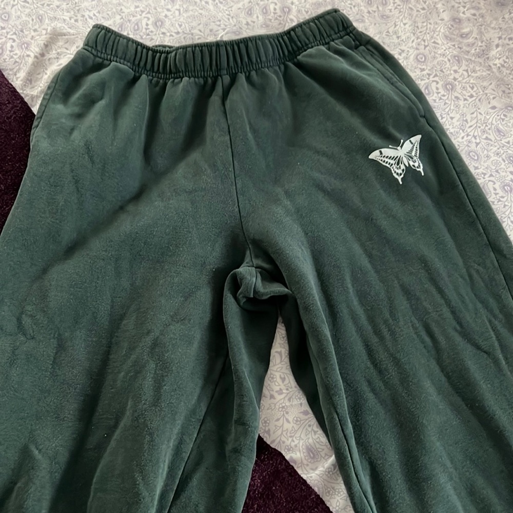 Green sweatpants with butterfly